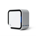 A white Avari QB air purifier with a black rim and blue LED lights on the front, designed to be compact and silent side view image