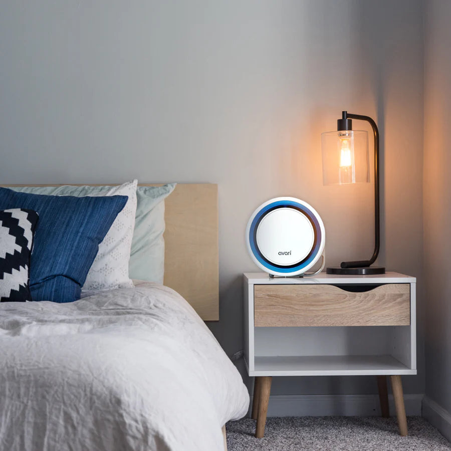 avari av-525 blue air purifier in a  bedroom