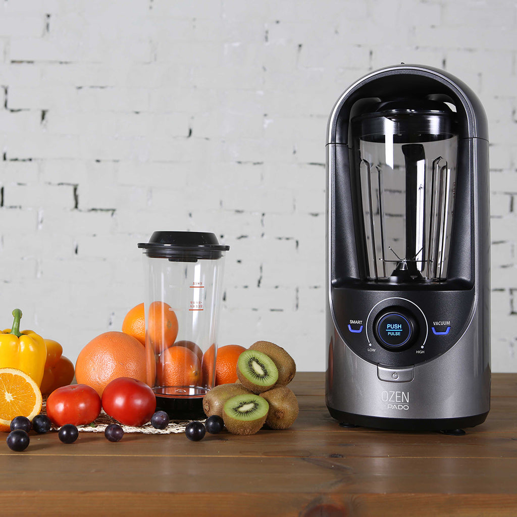 Pado Ozen 310 gray blender on wooden table with fruits 